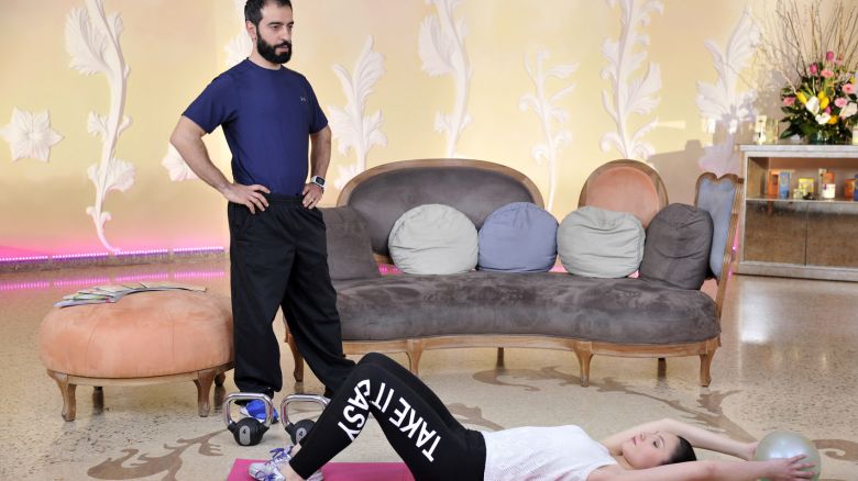 Il trainer Stefano Lazzarini con la modella Giada