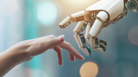 mano umana e mano di robot